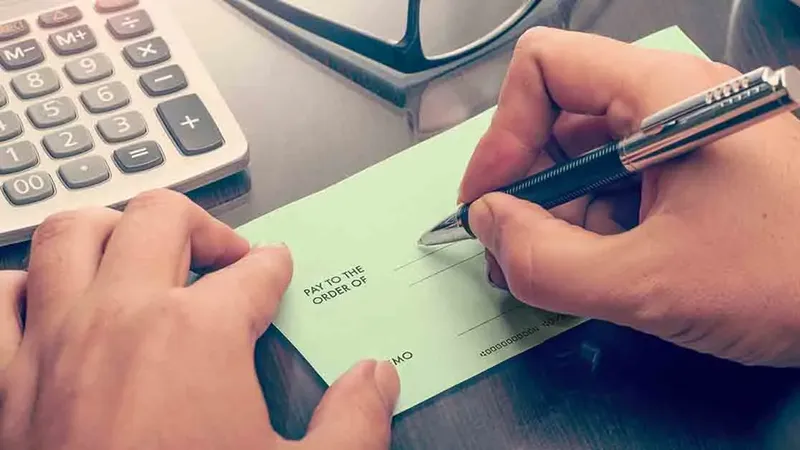 How to Sign/Endorse a Check Over to Someone Else | Huntington Bank
