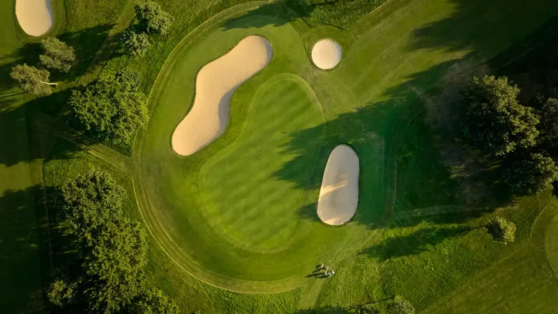 golf course putting green with sand