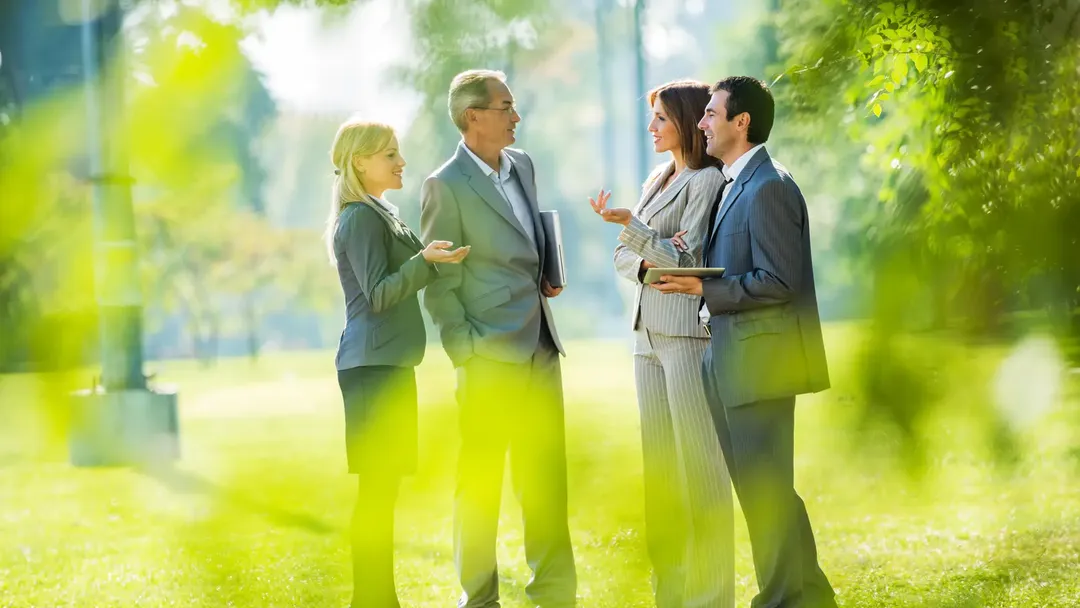 group-of-business-people-meeting-outside