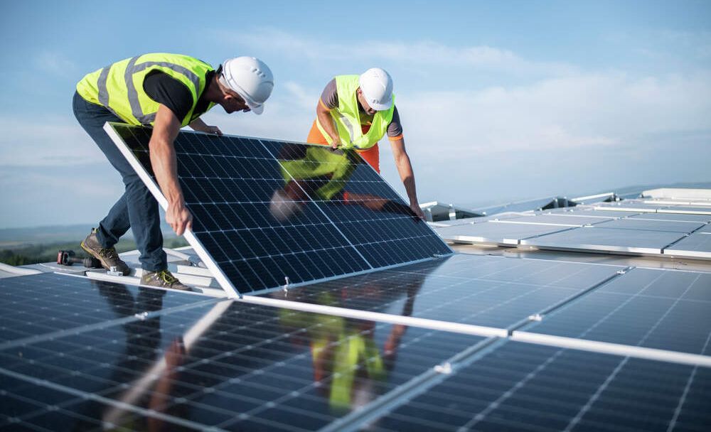 workers-installing-solar-panel