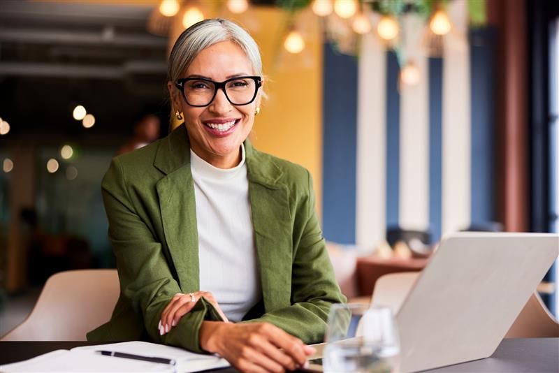 Business Woman in Green Blazer