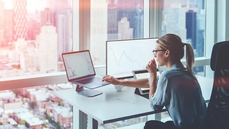 female-financial-analyst-at-desk